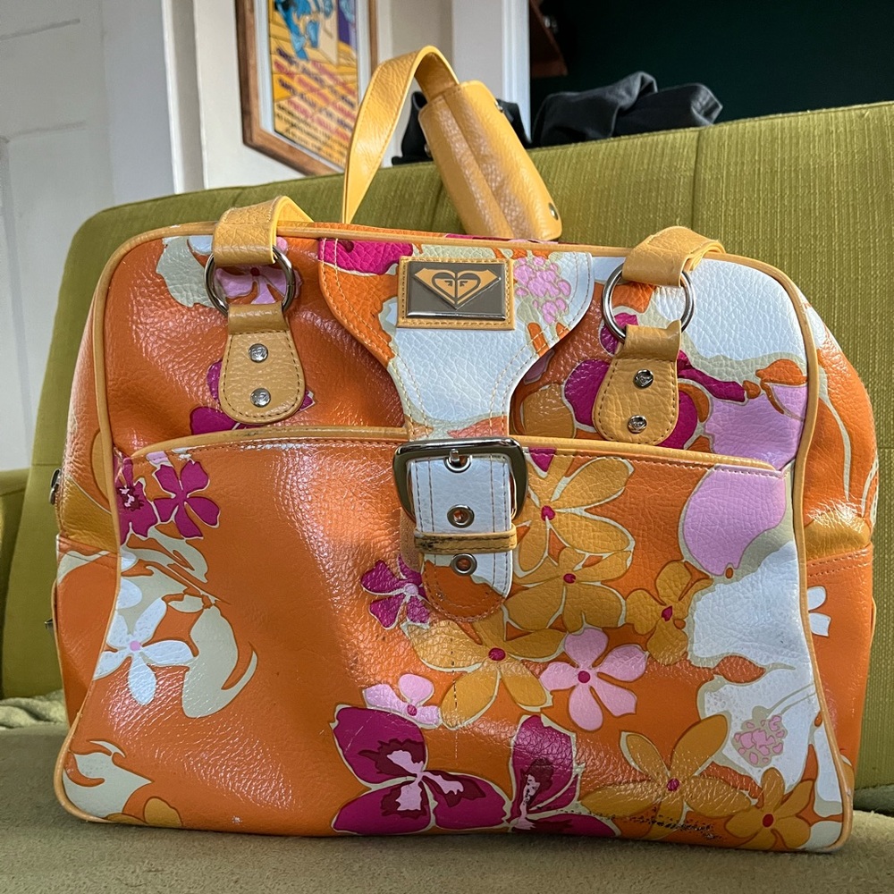 Vintage Roxy rolling duffel bag and Carry on